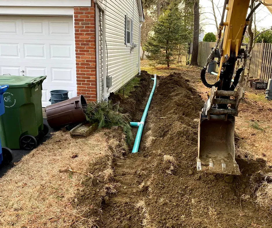 Excavation for French Drain Along House Exterior – New Hampshire